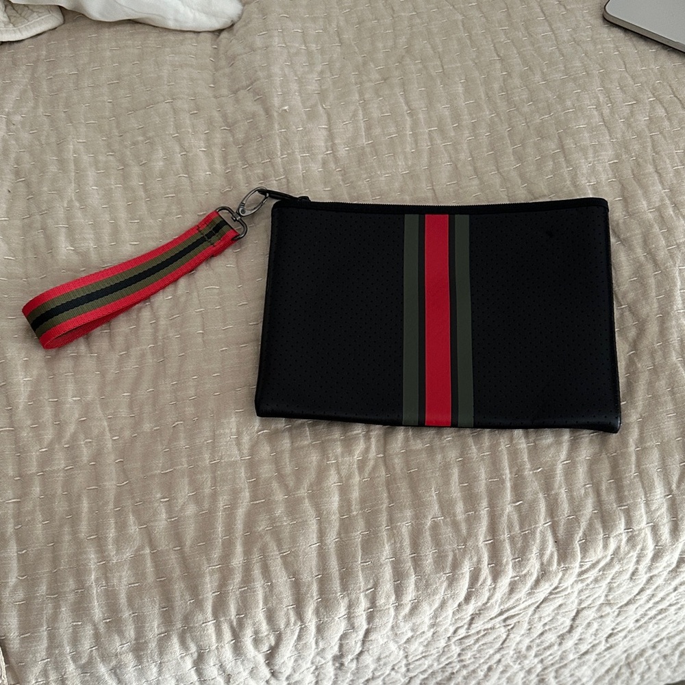 HAUTE SHORE Black Clutch with Red and Green Accents